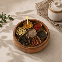 Opened a brass spice box with seven containers filled with spices