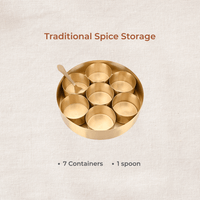 Brass masala dabba with seven empty spice containers top view
