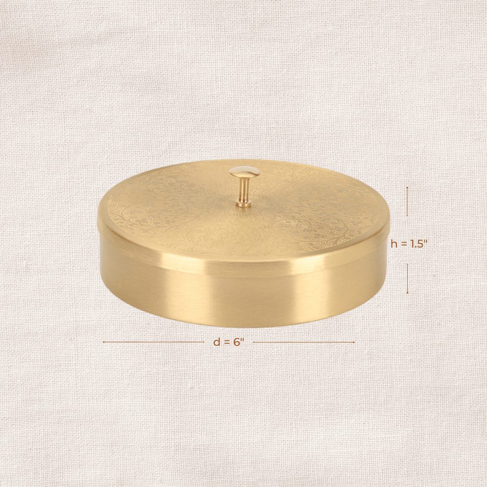 Side view of brass masala dabba showing height and diameter